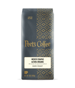 Peet's Coffee Mexico Chiapas Altura Organic package with gold text and pattern on a dark background