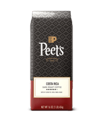 Peet's Costa Rica dark roast coffee package on a green background