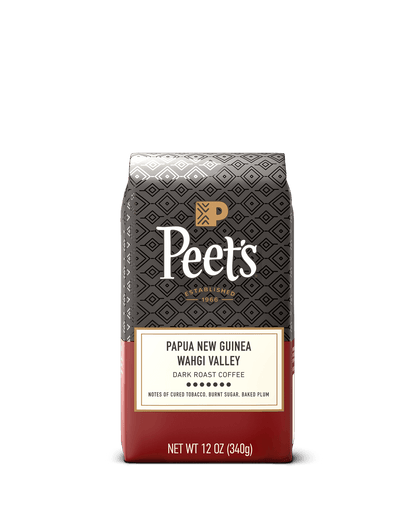 Peet's coffee bag with detailed branding and product information on a black background